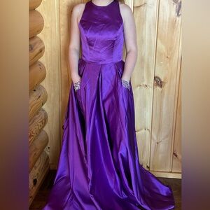Long purple prom dress with glittery pockets